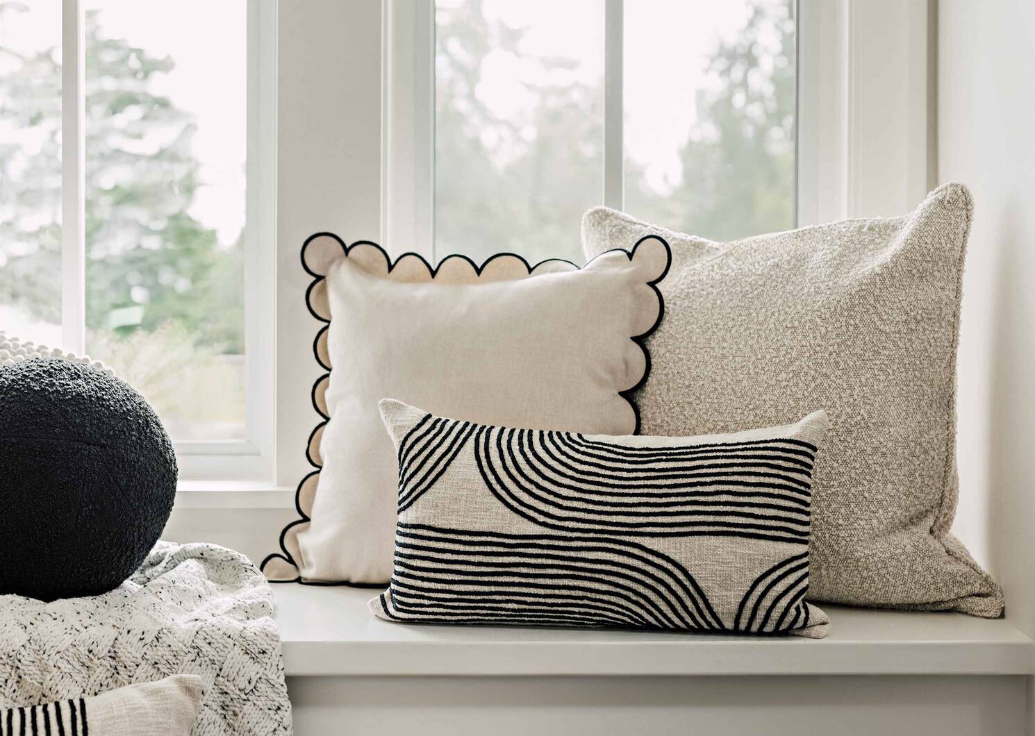 Coussin Evora 12x22 sable/noir